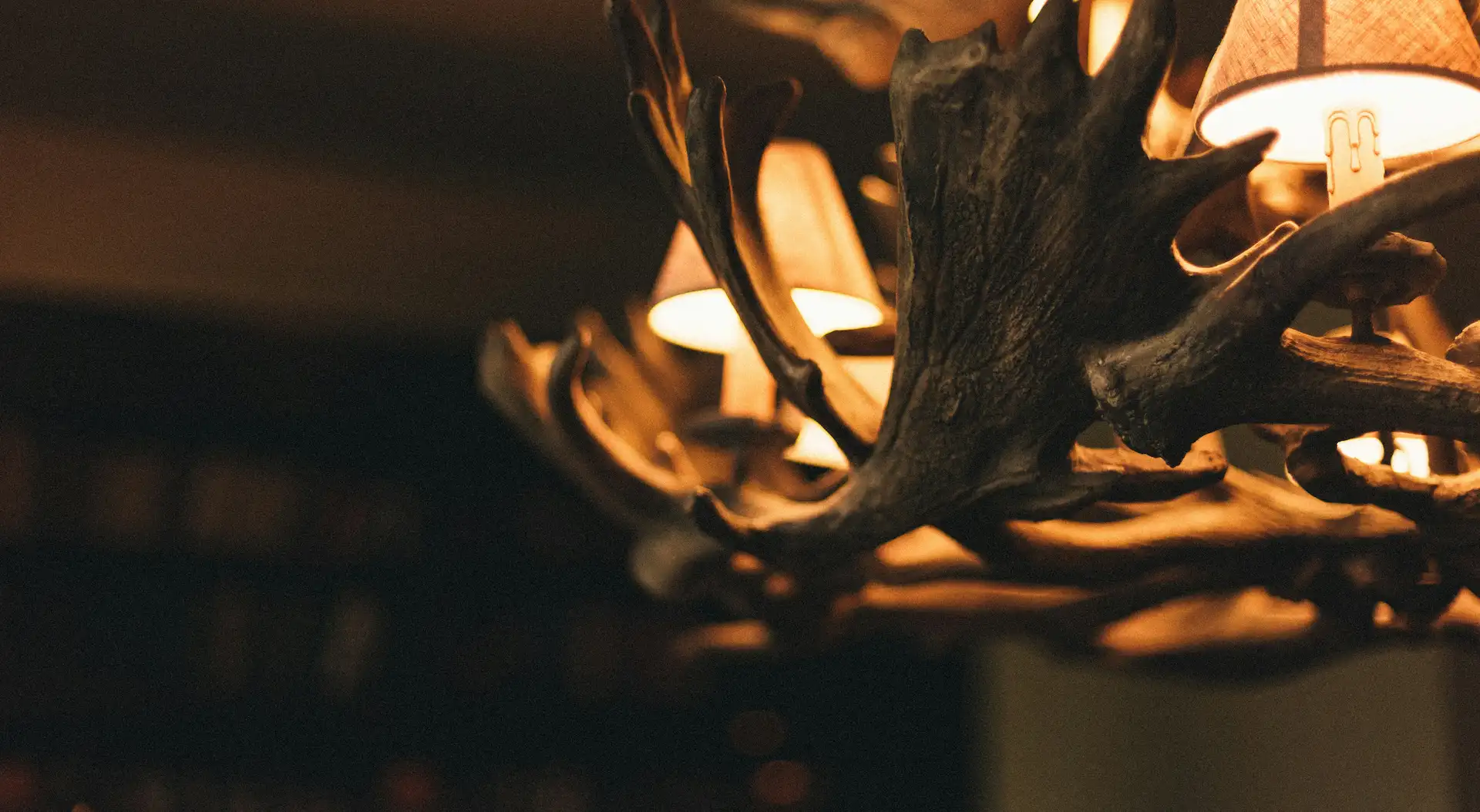 Luxury hotel room with high ceilings and architectural lighting